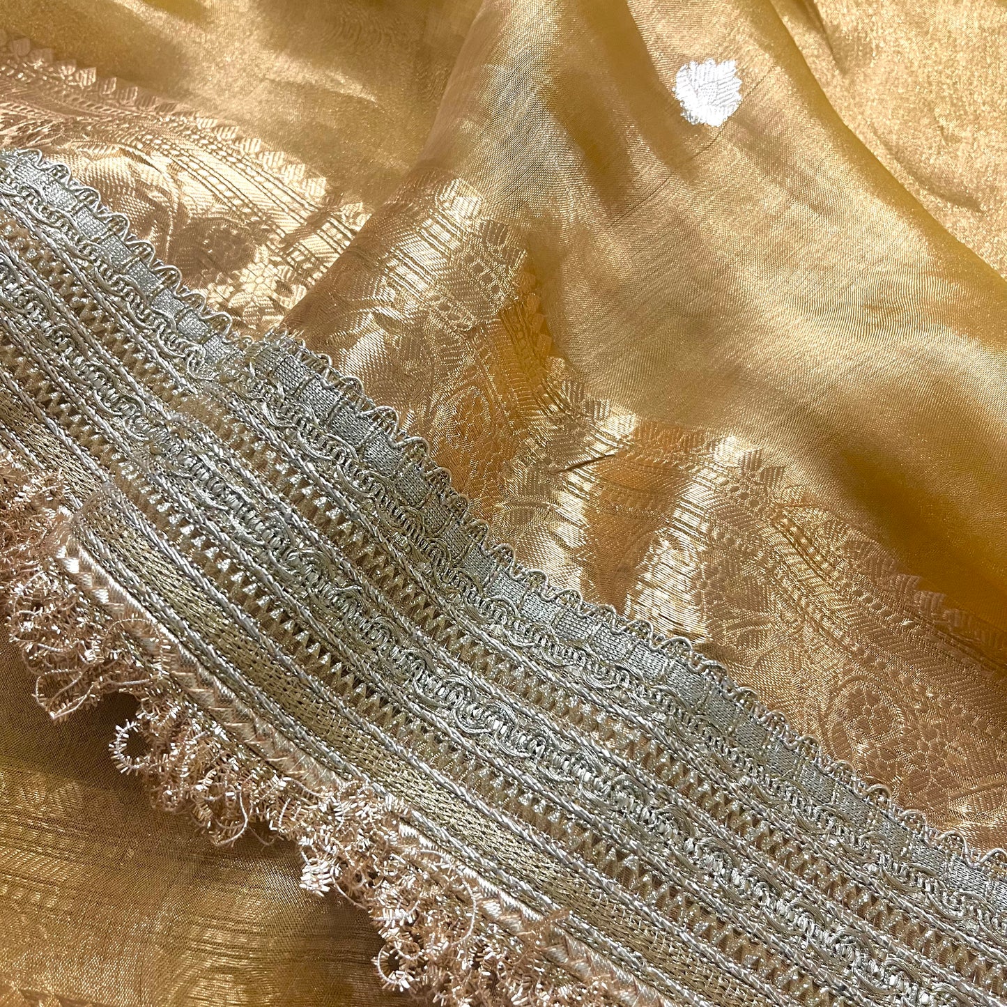 Gold Banarasi tissue silk saree with zari bootis and border
