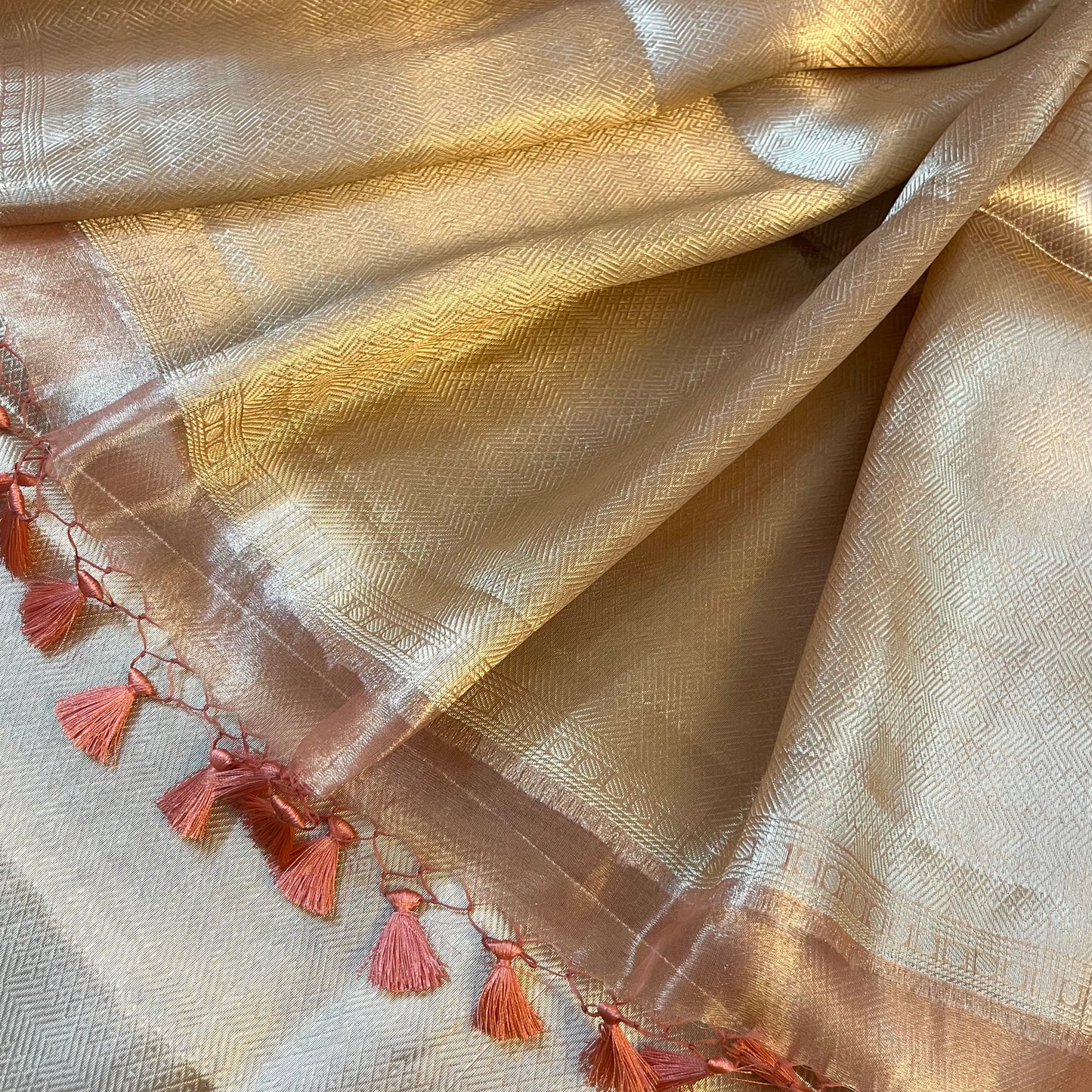 Champagne gold Banarasi silk saree with zari pattern all over