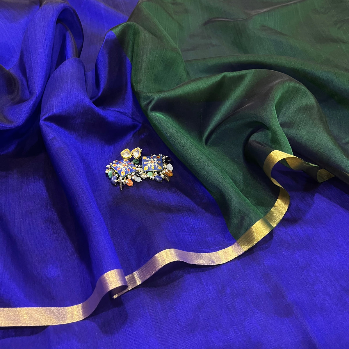 Indigo and green Chanderi silk saree with zari border