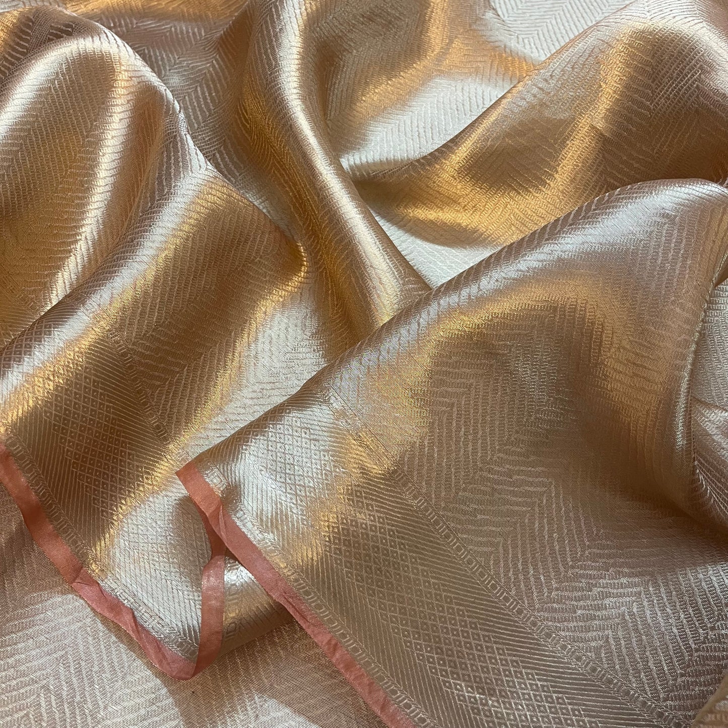 Champagne gold Banarasi silk saree with zari pattern all over