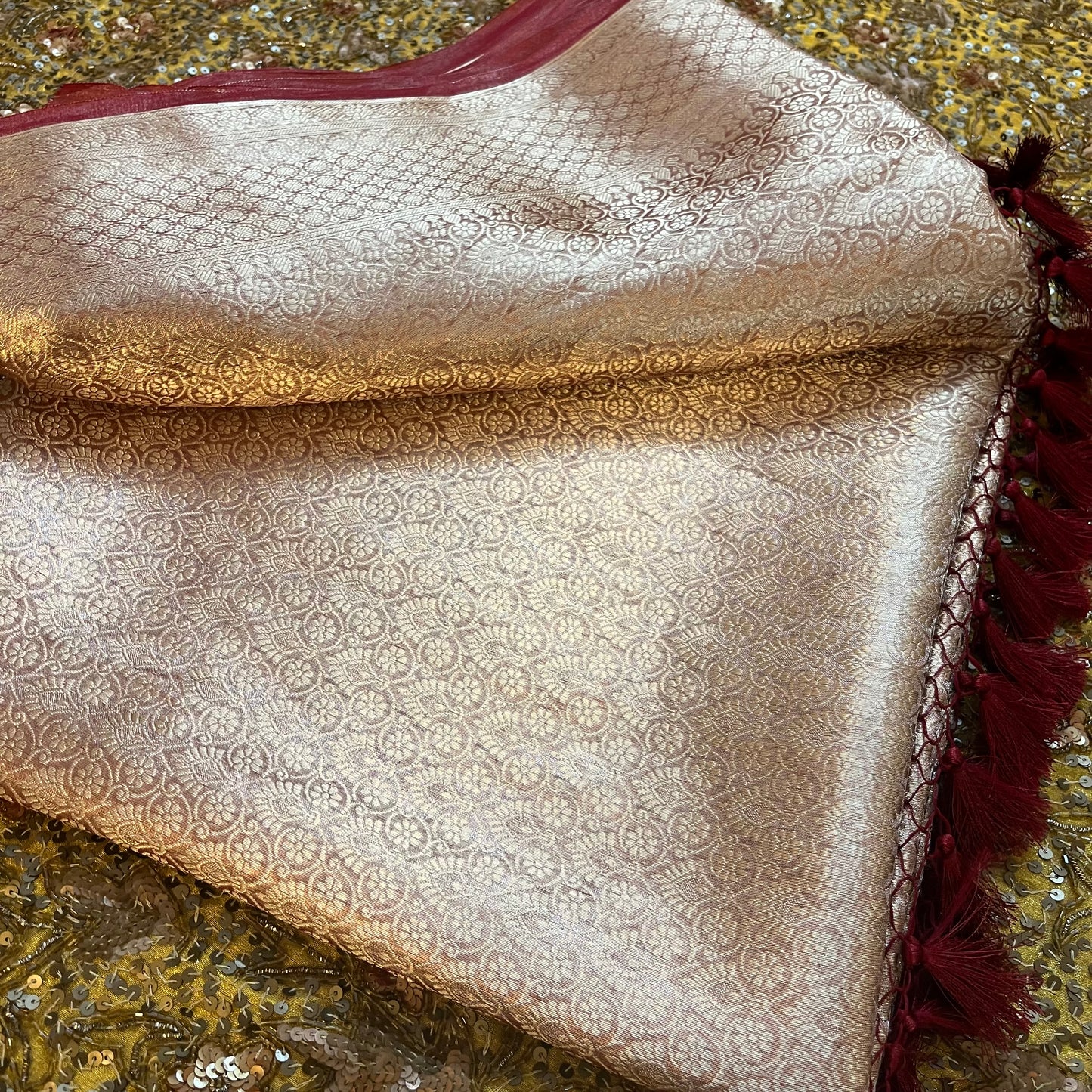 Champagne & Red Banarasi Brocade silk saree with zari pattern all over