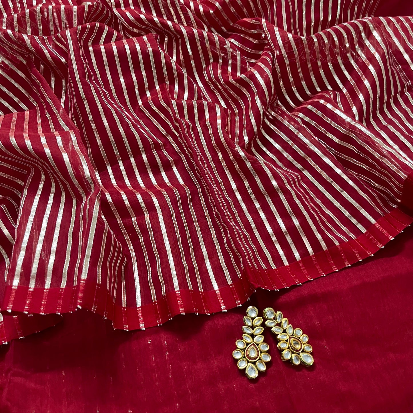 Deep red chanderi saree with intricate gota work all over