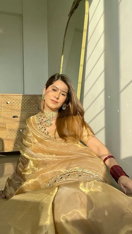 Molten gold chanderi tissue silk saree with dangling mirror work border