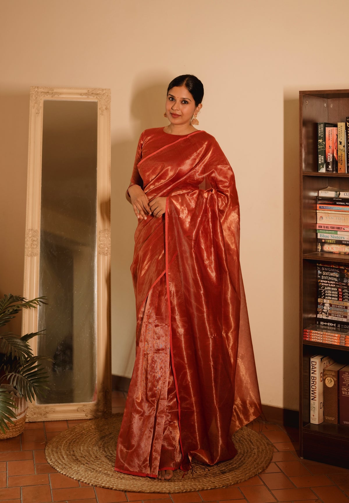 Red Maheshwari saree with zari lines all over