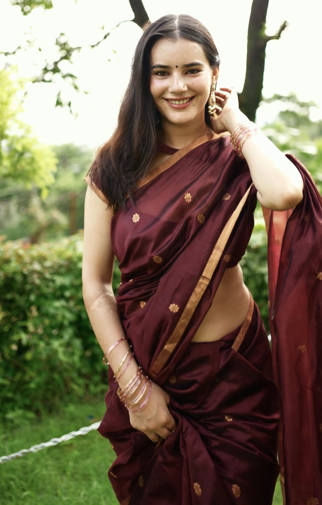 Mahogany Chanderi silk saree with flower bootis all over