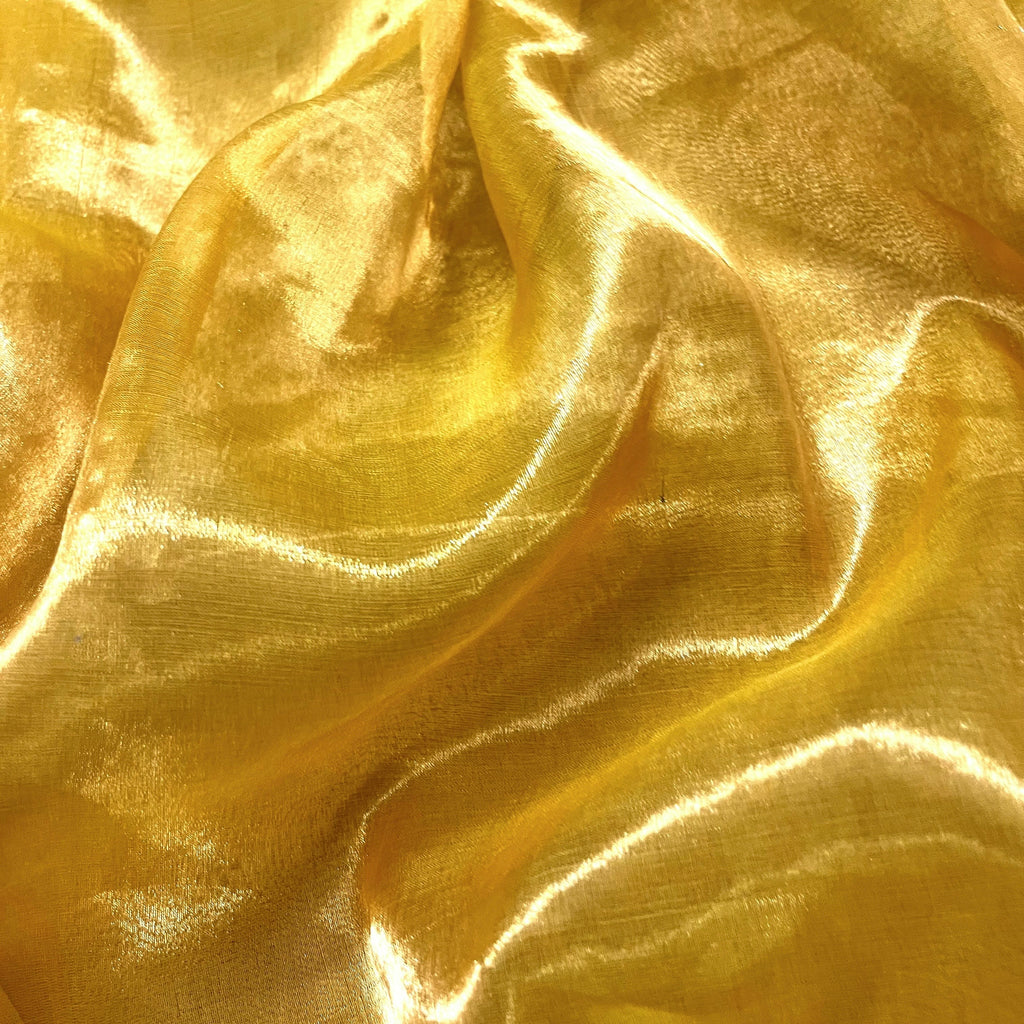 Molten amber gold chanderi tissue silk saree with mirror work border