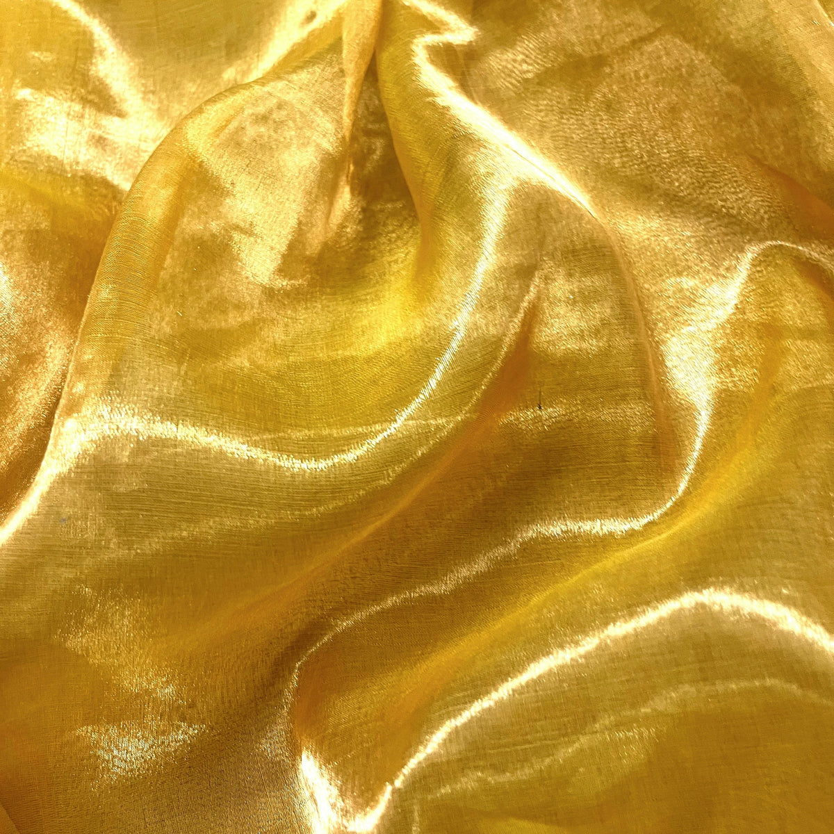 Molten amber gold chanderi tissue silk saree with mirror work border