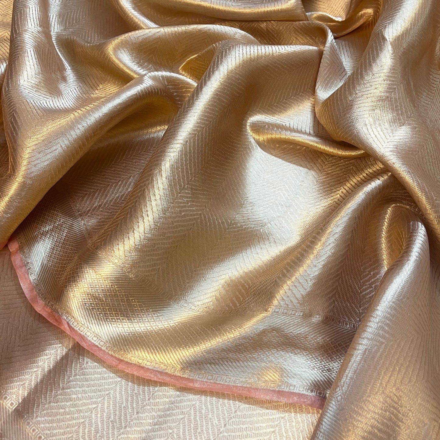 Champagne gold Banarasi silk saree with zari pattern all over