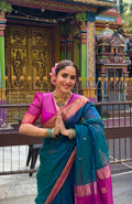 Peacock and Violet dual tone Maheshwari saree with flower motifs on pallu