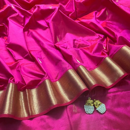 Rani pink Maheshwari silk saree with zari motifs on pallu