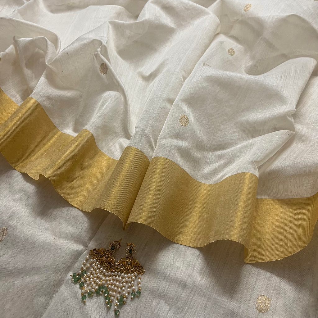 Off white Chanderi saree with zari bootis all over and zari motifs on pallu