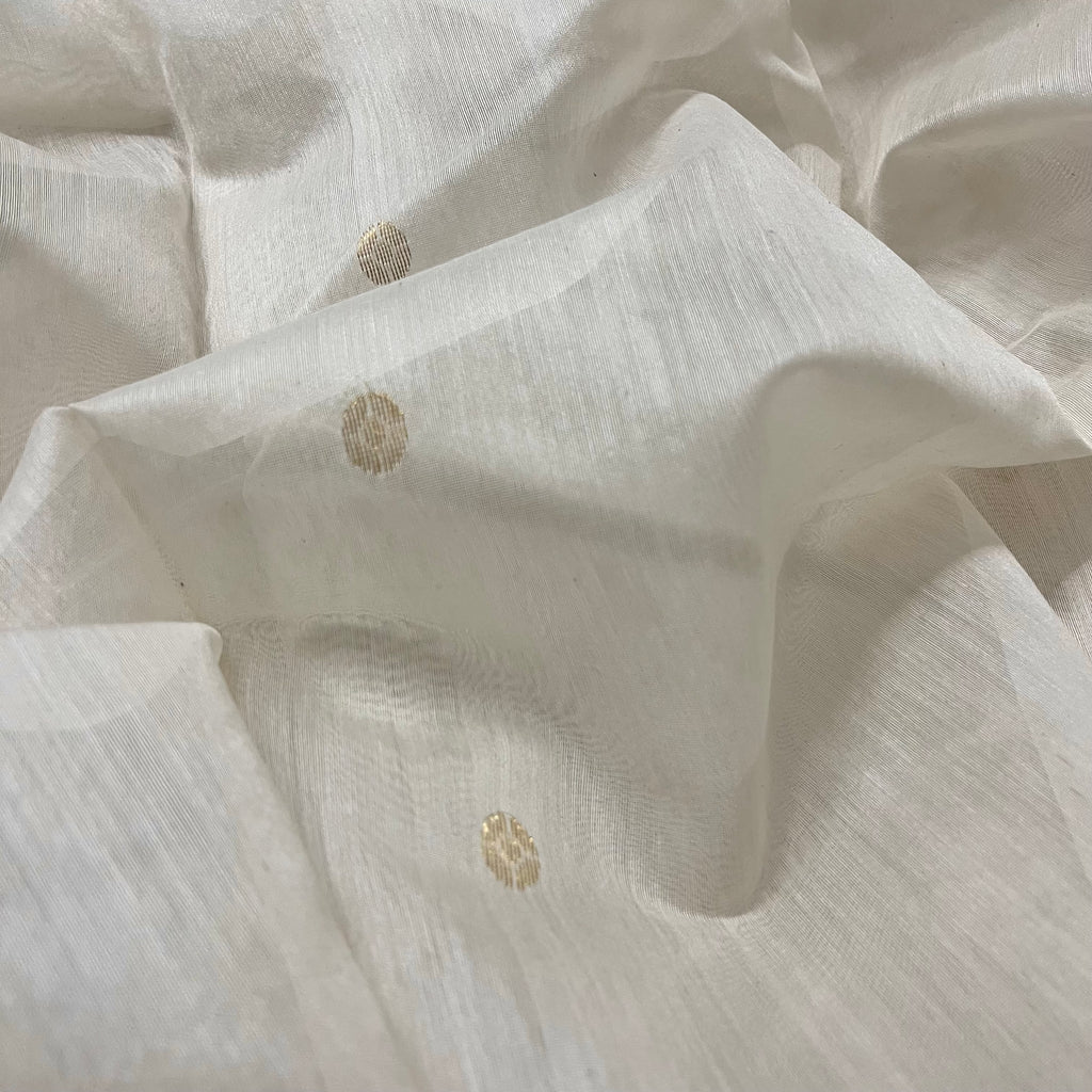Off white Chanderi saree with zari bootis all over and zari motifs on pallu