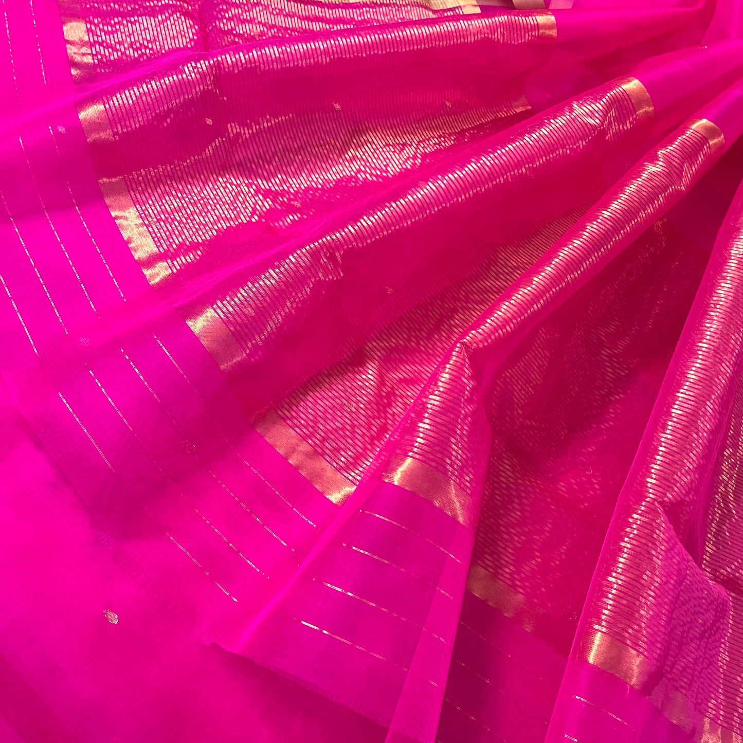Fuschia pink Chanderi silk saree with zari bootis all over