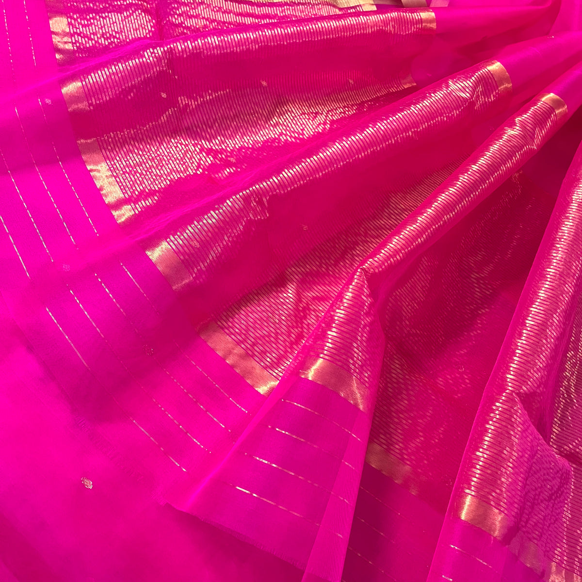 Fuschia pink Chanderi silk saree with zari bootis all over