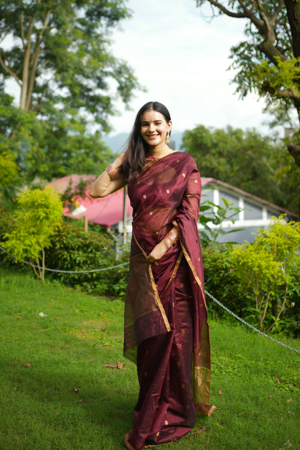 Mahogany Chanderi silk saree with flower bootis all over