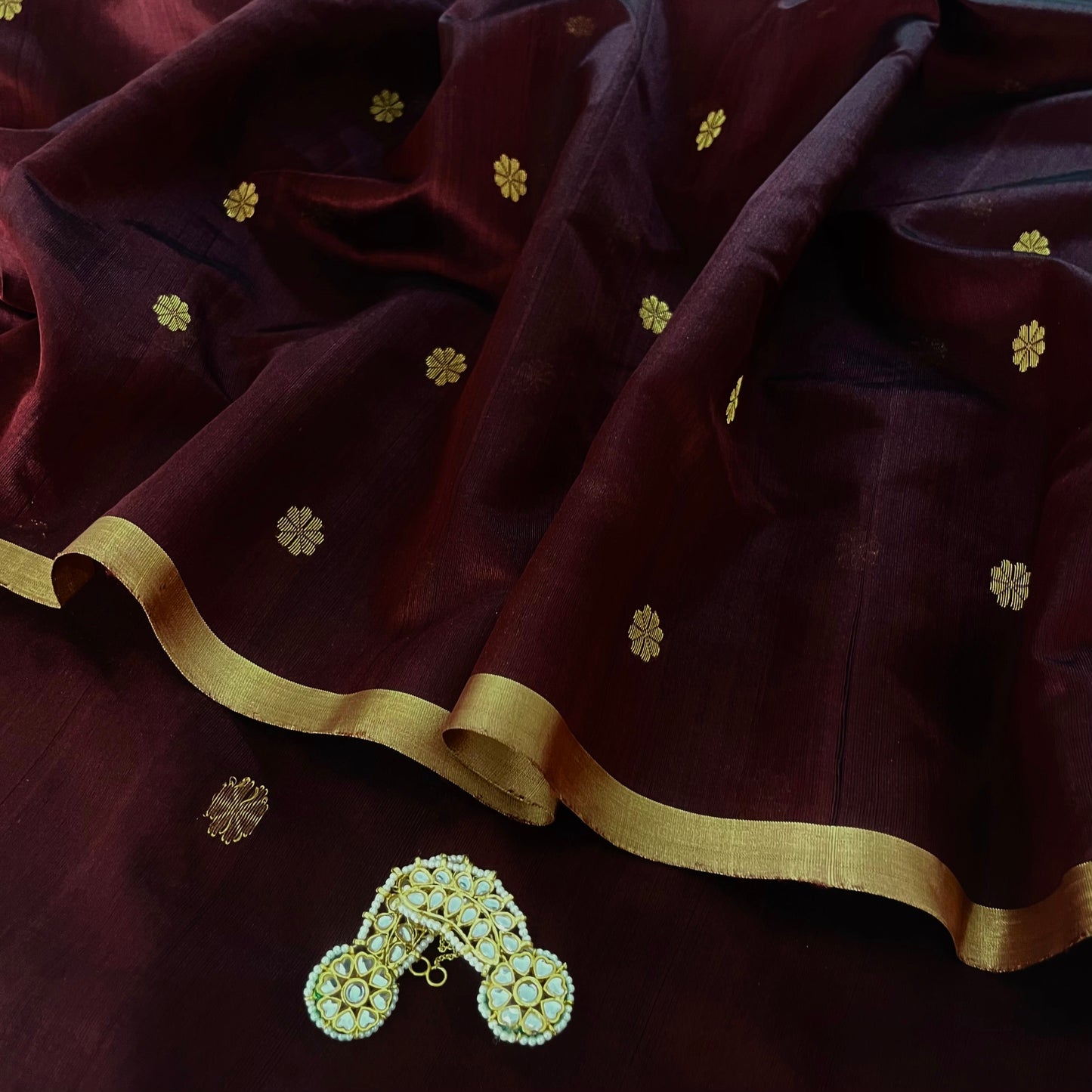 Mahogany Chanderi silk saree with flower bootis all over
