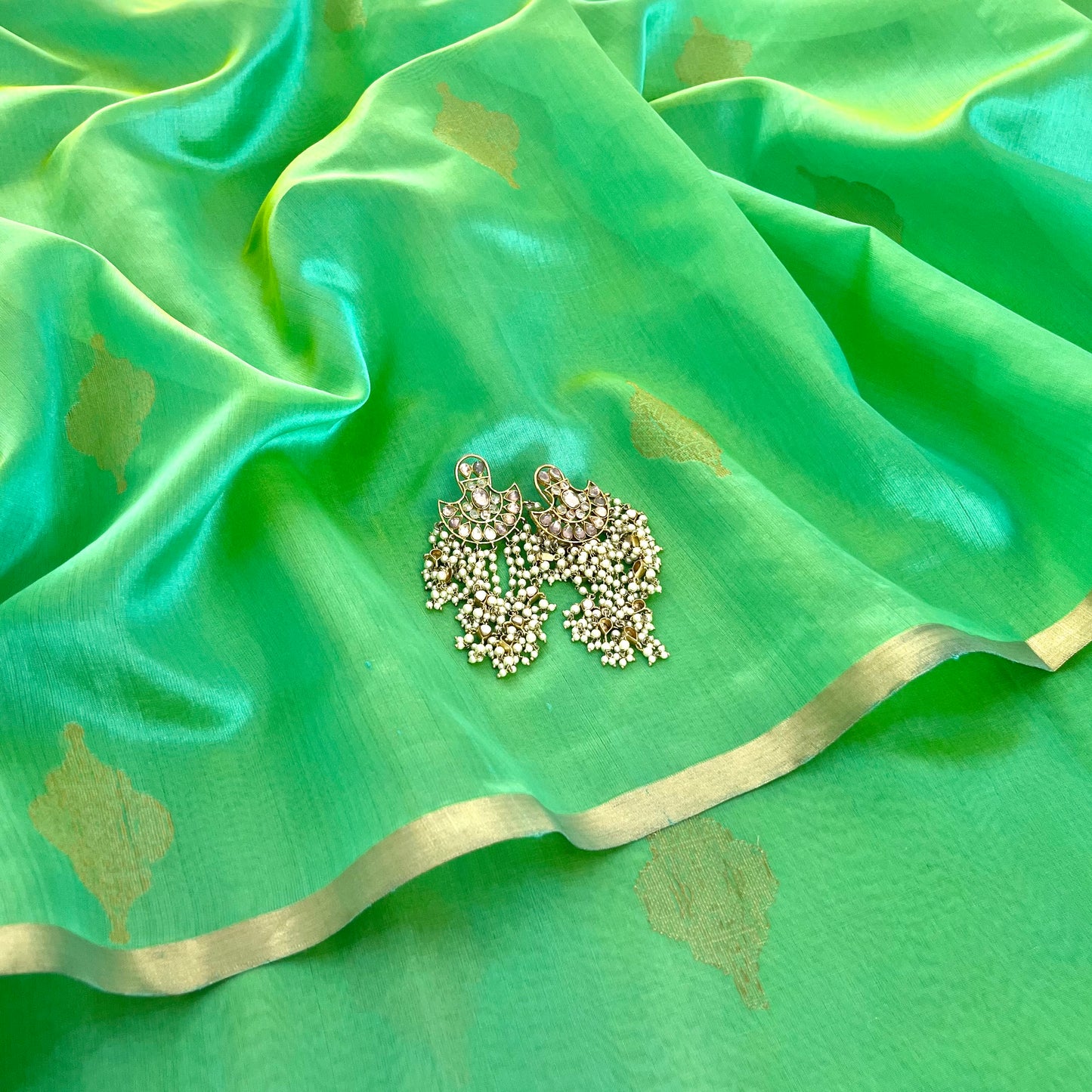 Sea green dual tone Chanderi silk saree with jhoomar motifs all over