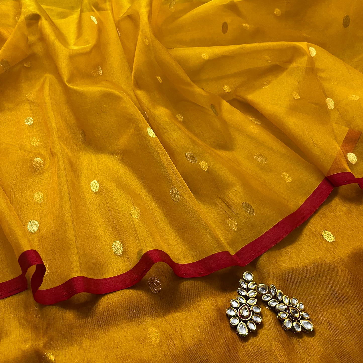 Mustard red Chanderi silk saree with zari bootis all over