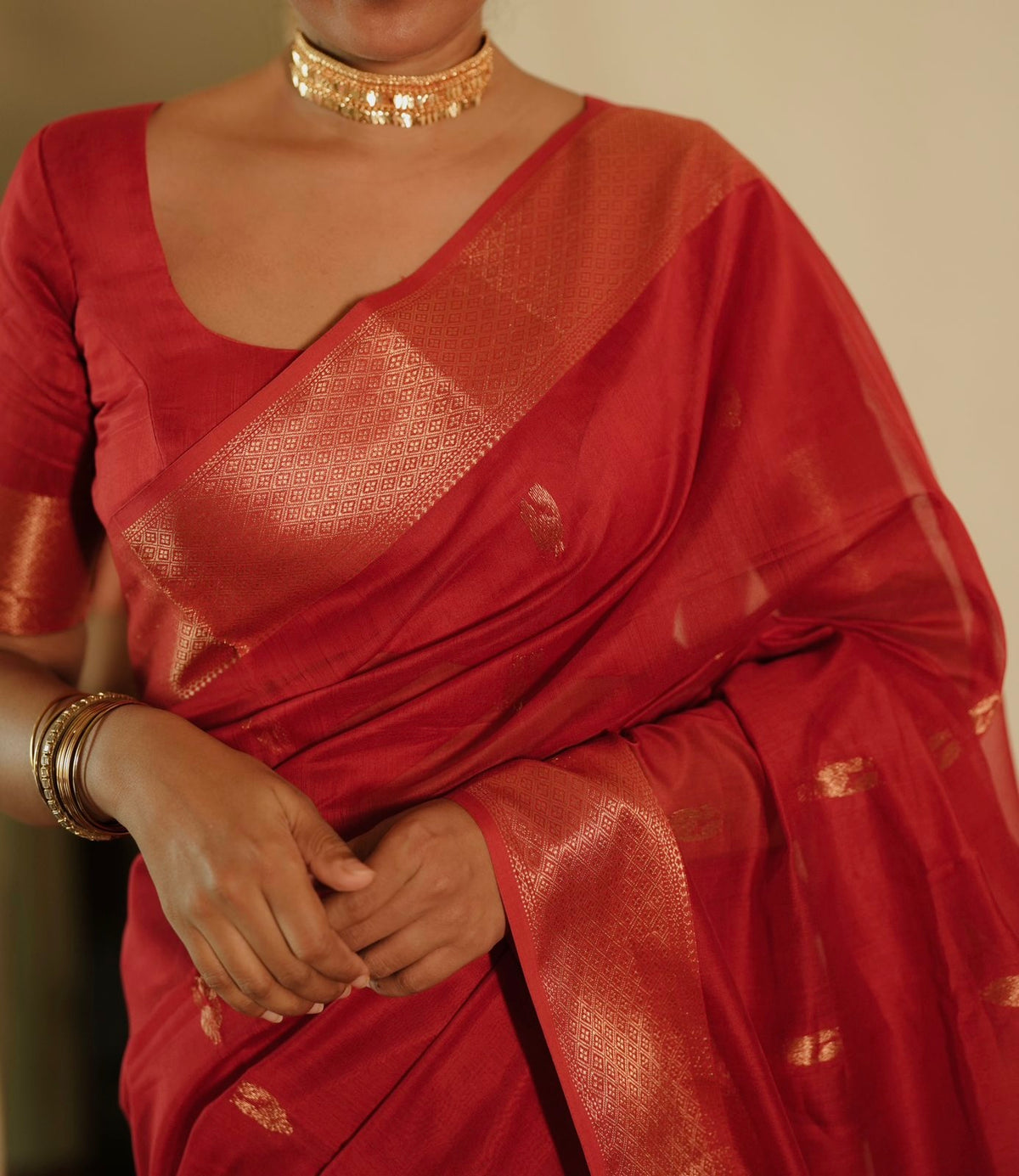 Red Maheshwari saree with morni motifs all over