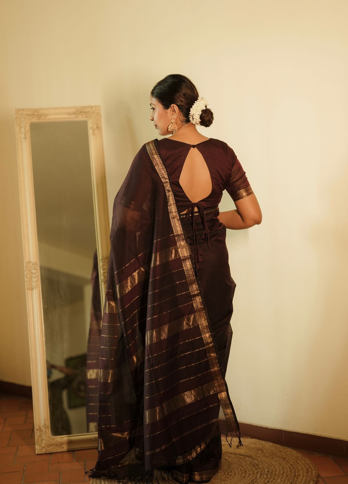 Mahoganay Maheshwari saree with zari border and zari lines on pallu