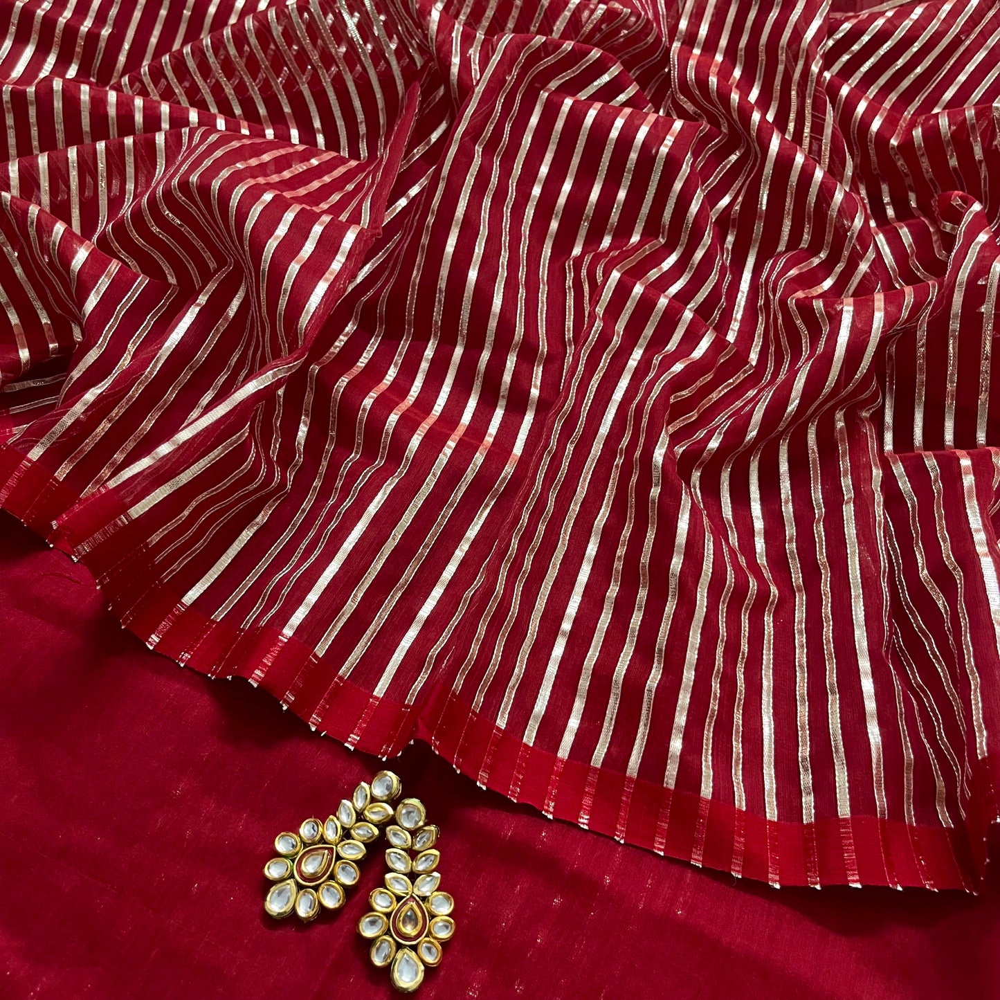 Deep red chanderi saree with intricate gota work all over