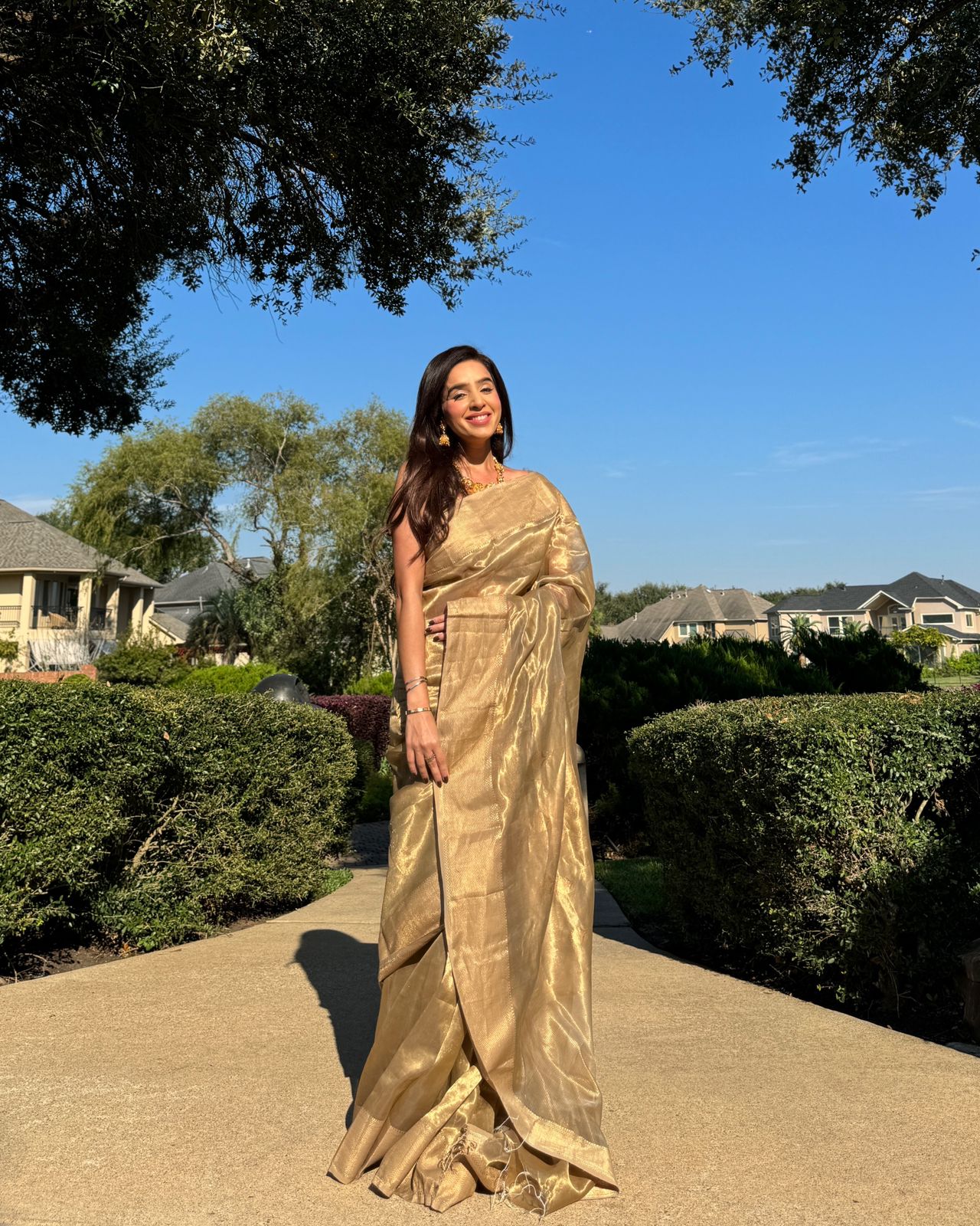Hazelnut gold maheshwari tissue silk saree with flower motifs all over