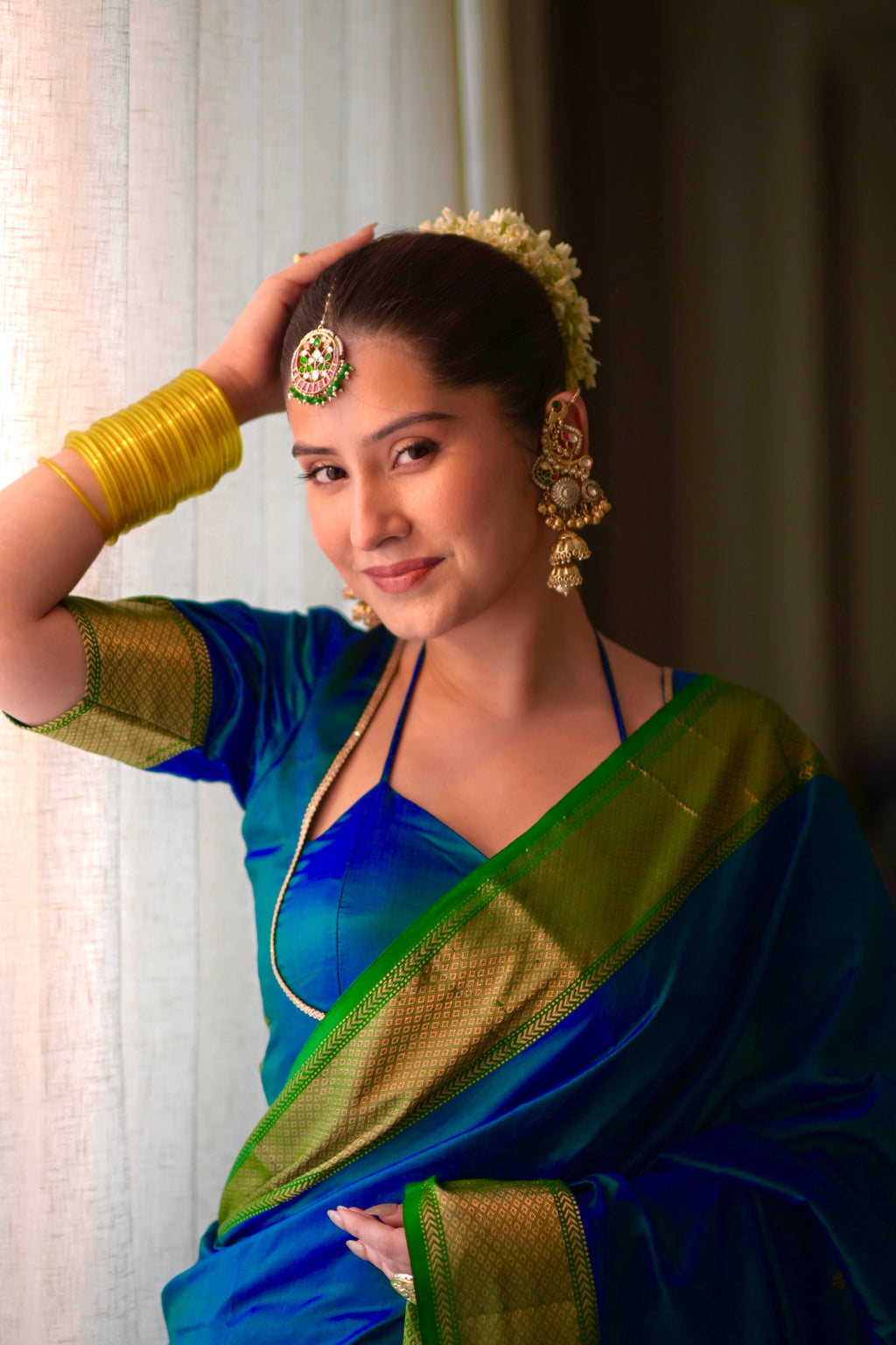 Peacock blue and green dual tone Maheshwari silk saree with zari bootis all over