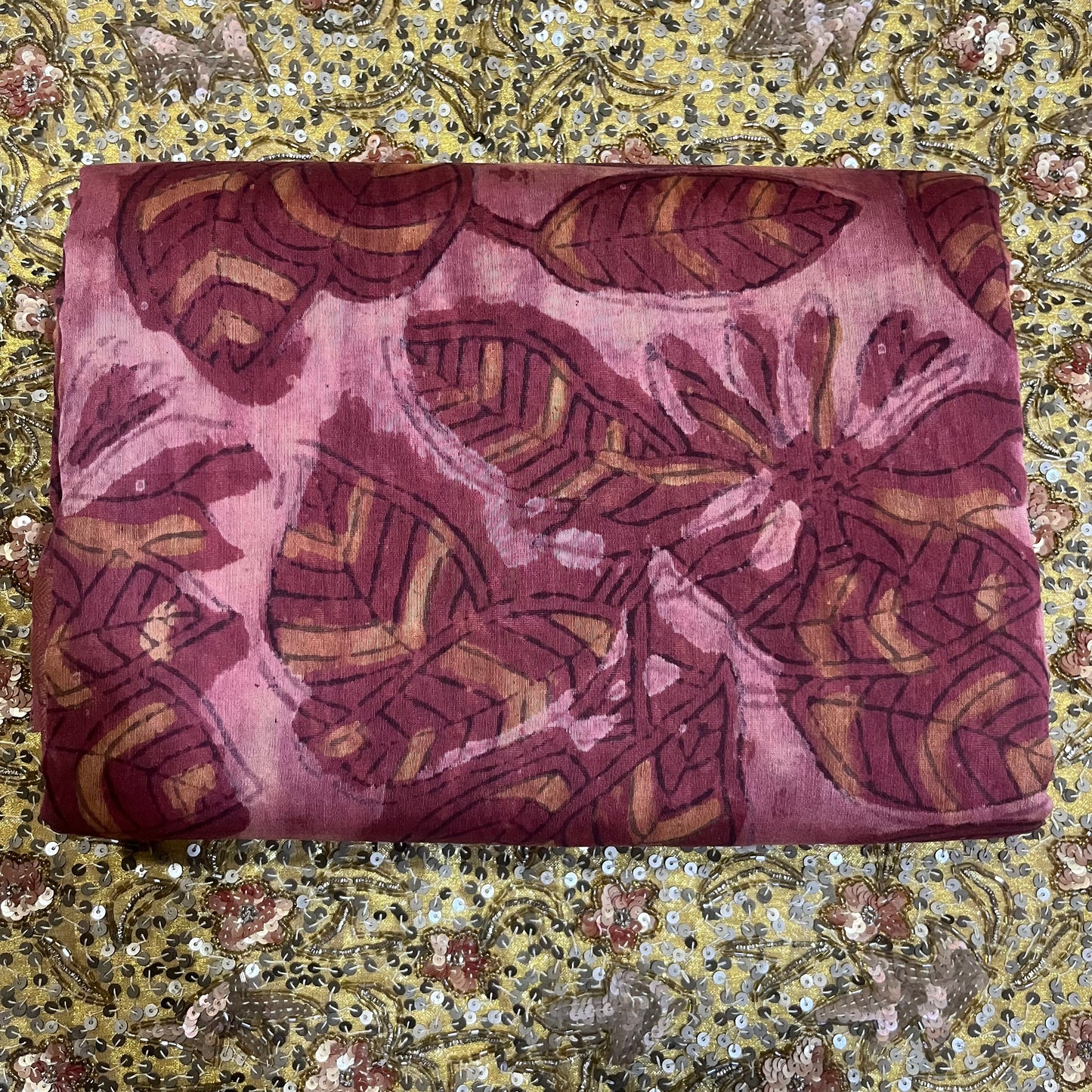 Rust pink Maheshwari saree with ajrakh print all over