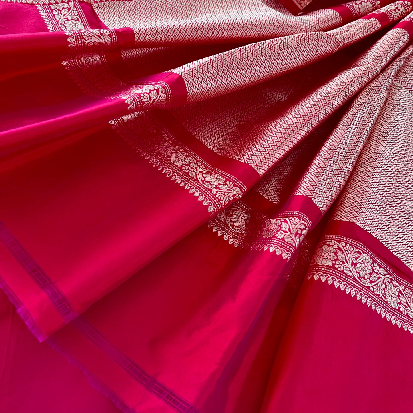 Pinkish Red dual tone Banarasi silk saree with resham bootis all over