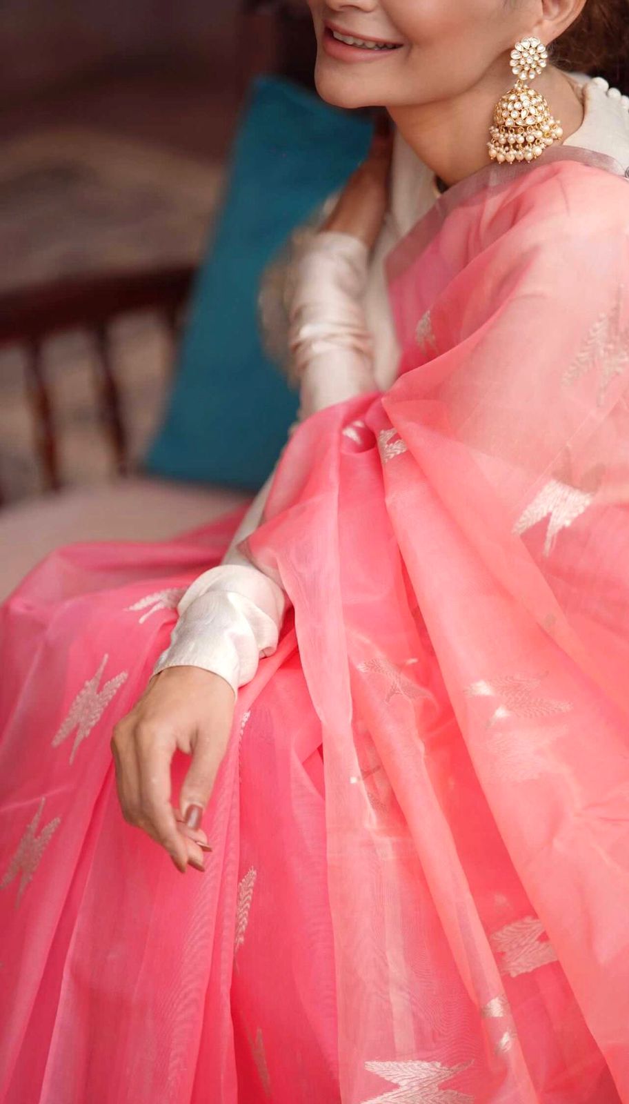 Peachish pink Chanderi organza silk with feather motifs all over