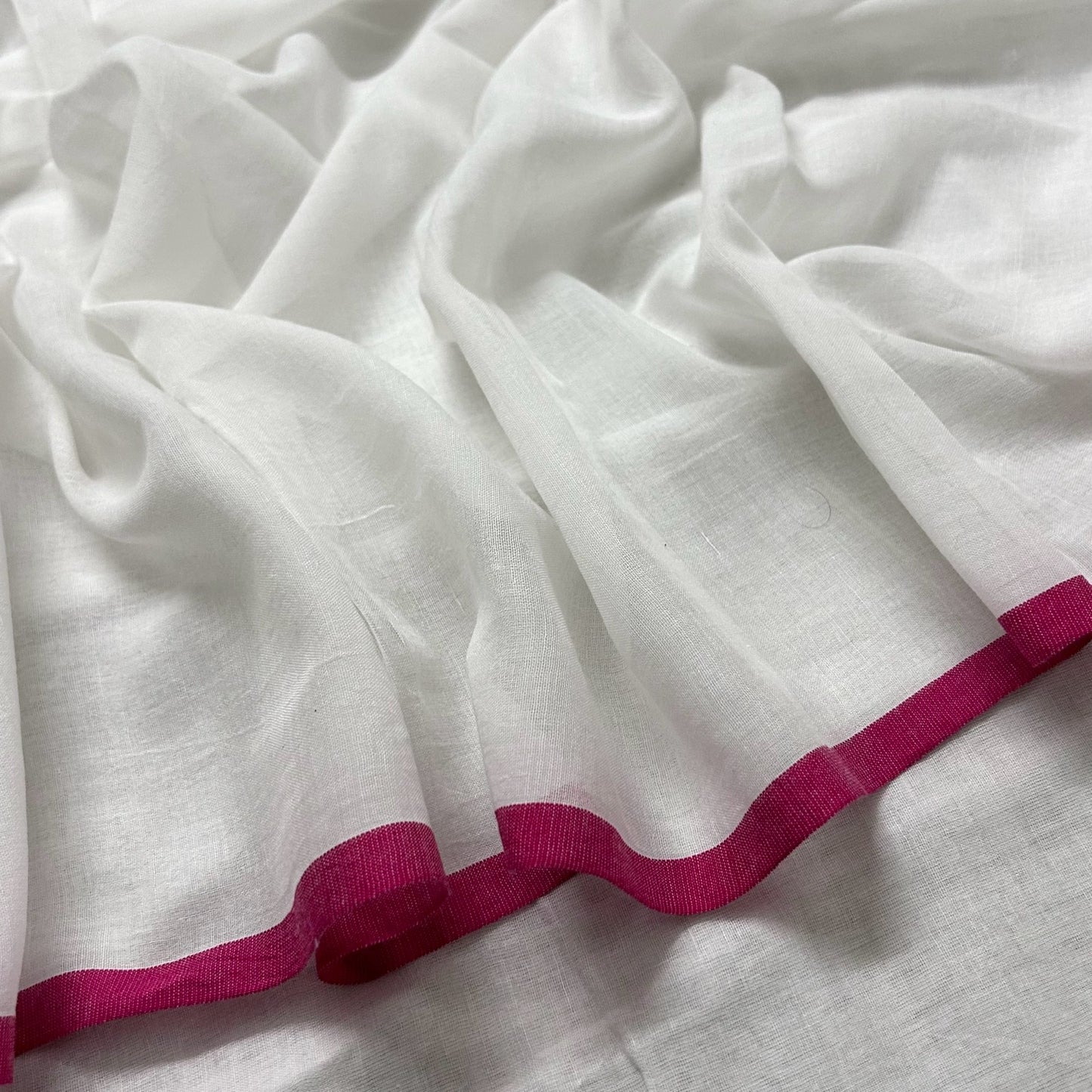 White and pink mulmul saree