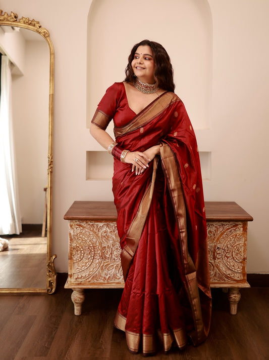 Deep maroon Maheshwari silk saree with zari bootis all over