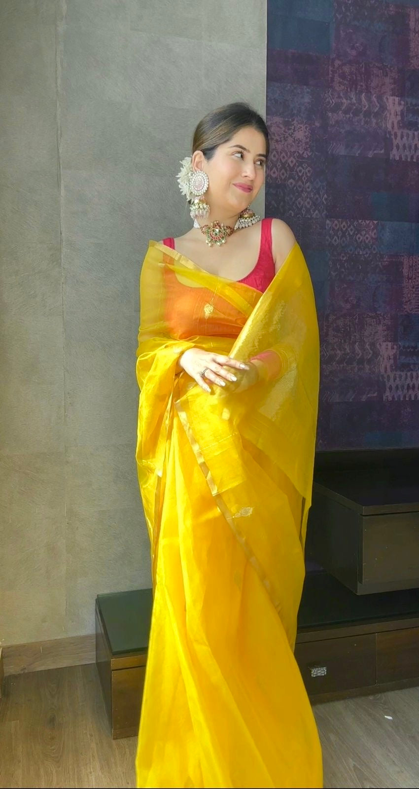Yellow chanderi organza silk saree with jhumka motifs all over