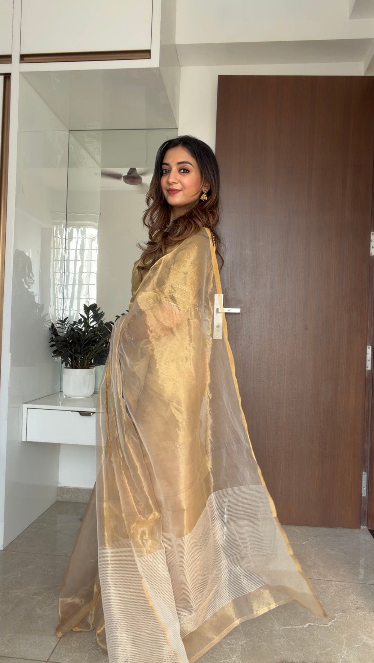 Gold Chanderi tissue silk saree with zari lines on pallu
