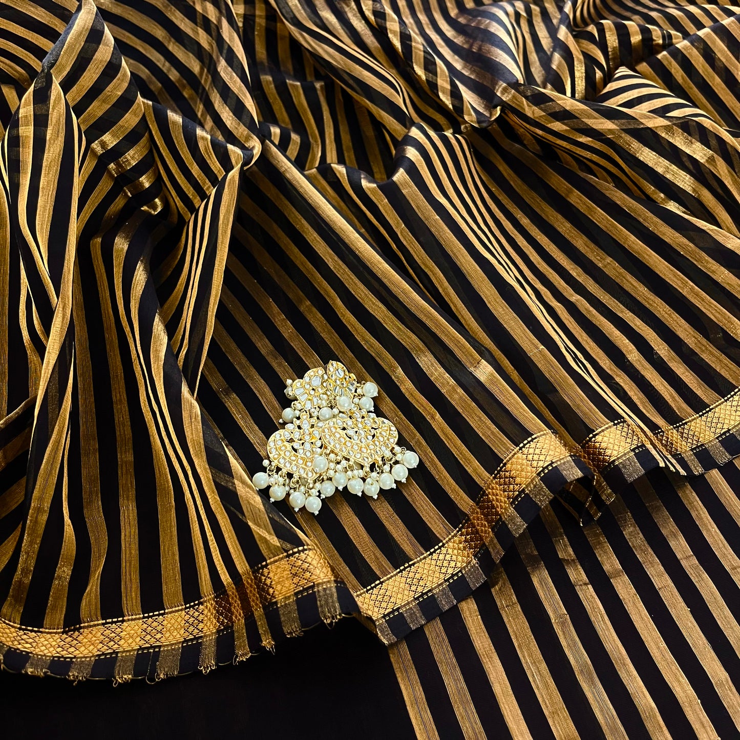Black Maheshwari saree with zari stripes all over