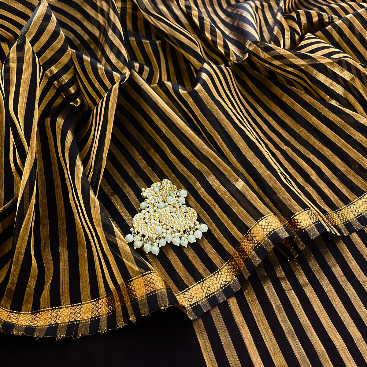 Black Maheshwari saree with zari stripes all over