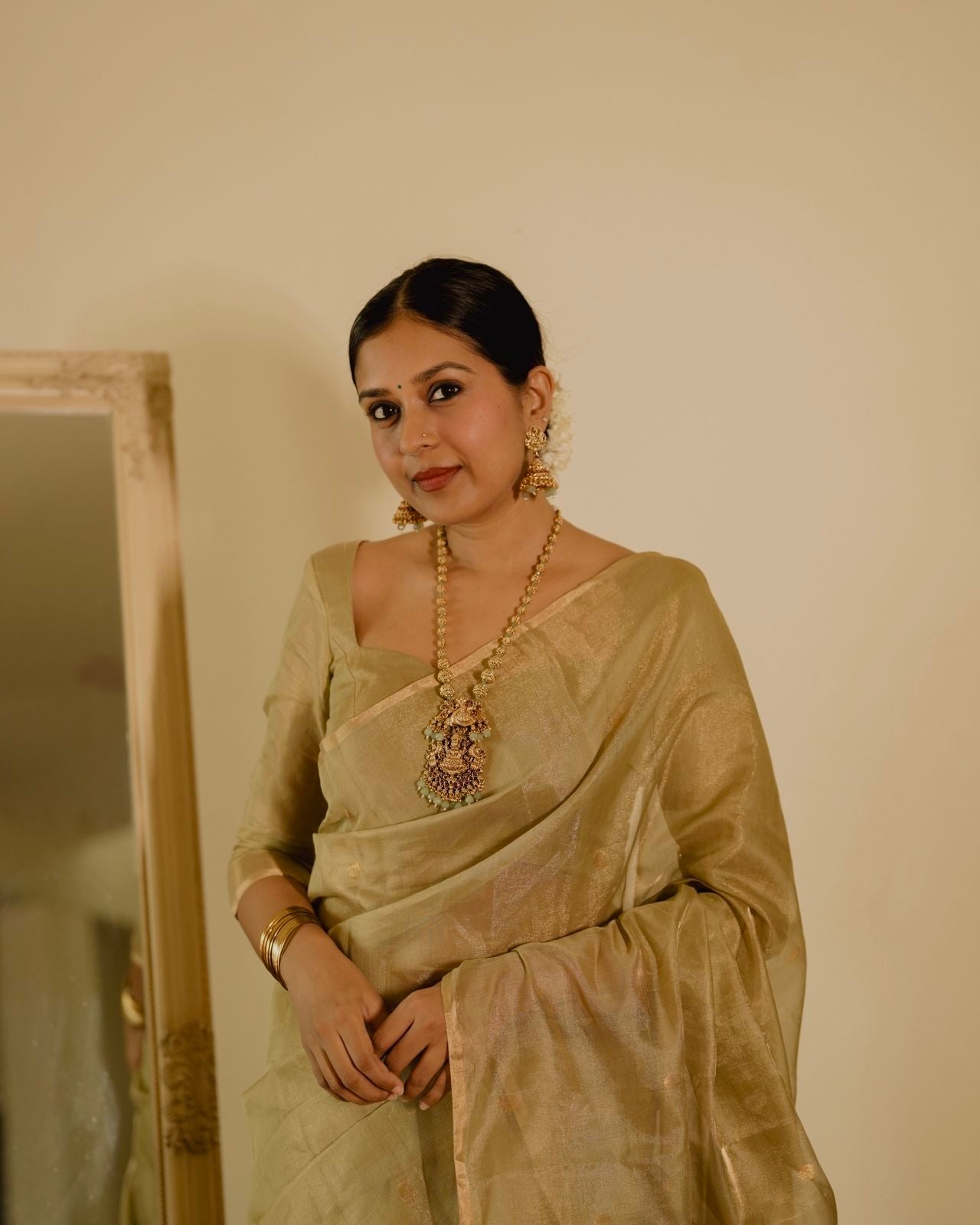 Olive gold Maheshwari tissue silk saree with zari bootis all over