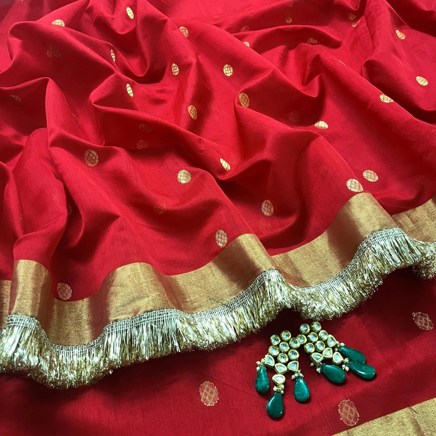 Red Chanderi saree with zari bootis and zari border all over