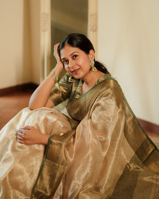 Cream Gold and green Maheshwari tissue silk saree with zari pattern on pallu