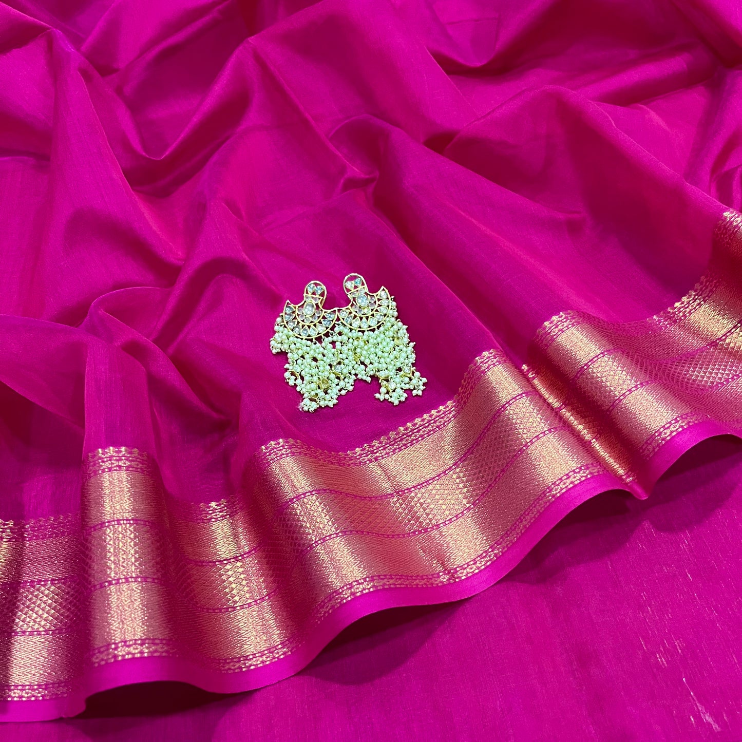 Rani pink Maheshwari saree with zari border