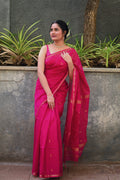 Rani pink maheshwari saree with zari border and zari bootis all over