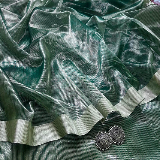 Dark green Maheshwari saree with silver zari lines all over