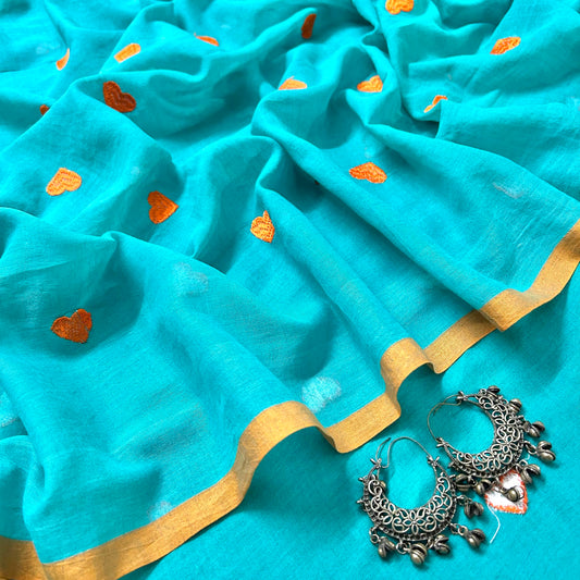 Turquoise and orange mulmul saree with little hearts all over
