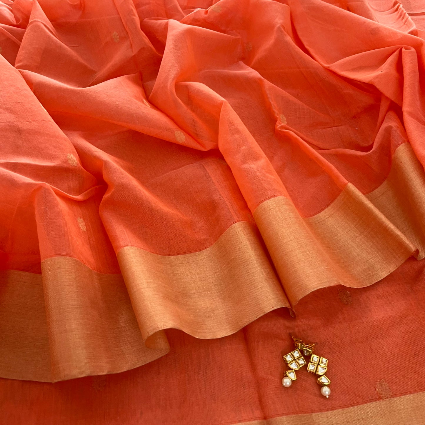 Peachish pink Chanderi saree with zari pattern on pallu