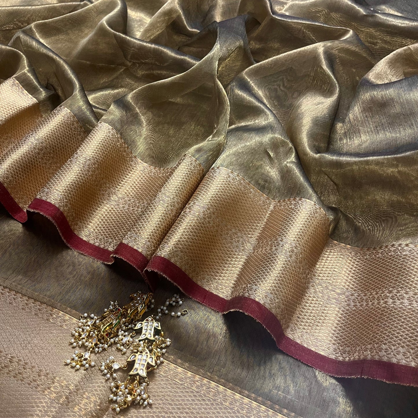 Antique gold and red Maheshwari tissue silk saree with zari pattern on pallu