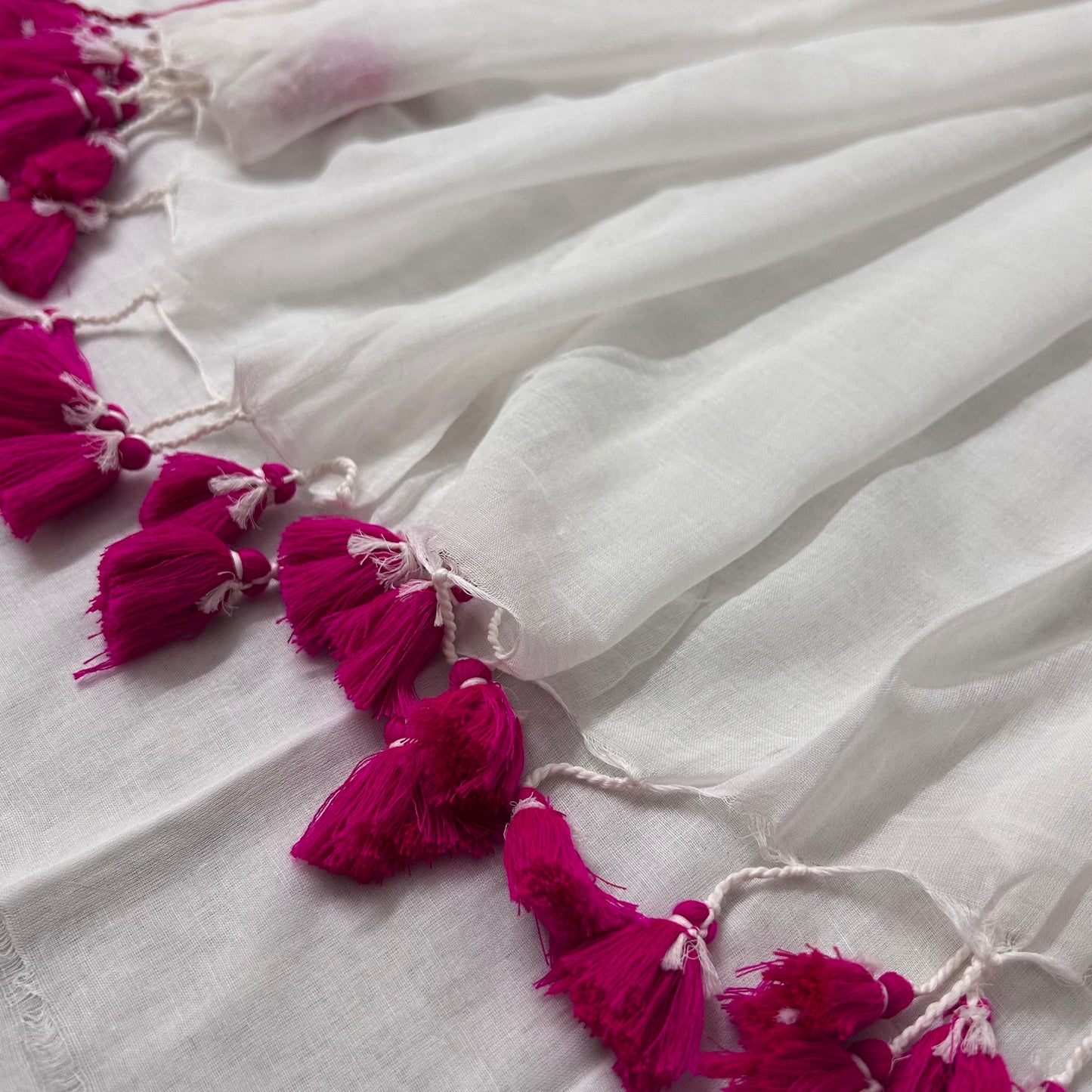 White and pink mulmul saree
