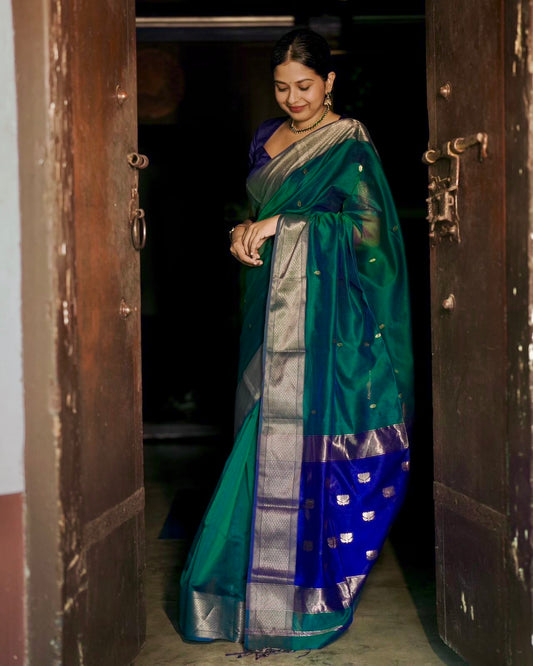 Dark Green and blue maheshwari dual tone saree with flower bootis all over
