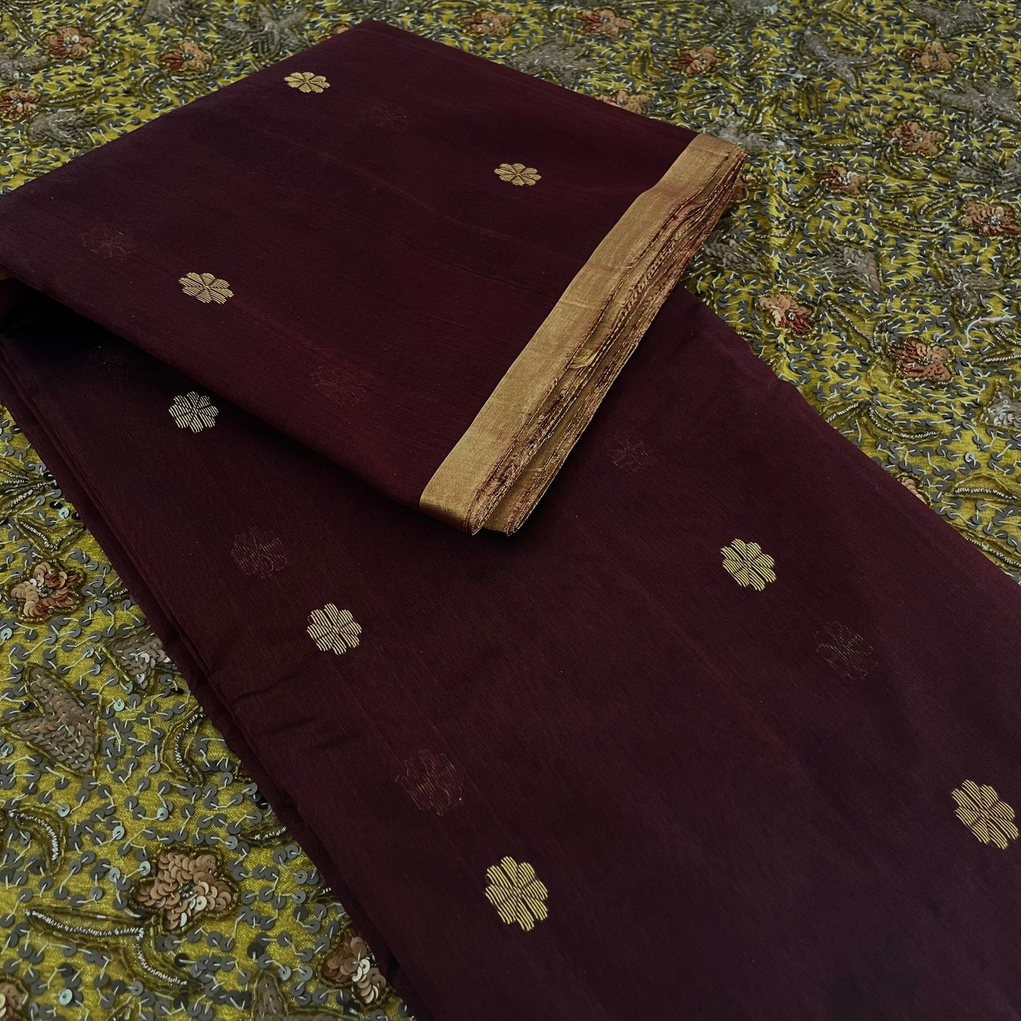 Mahogany Chanderi silk saree with flower bootis all over