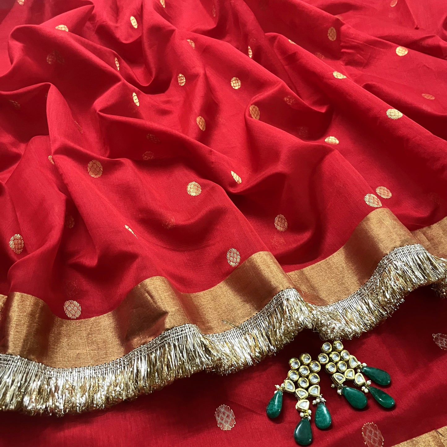 Red Chanderi saree with zari bootis and zari border all over