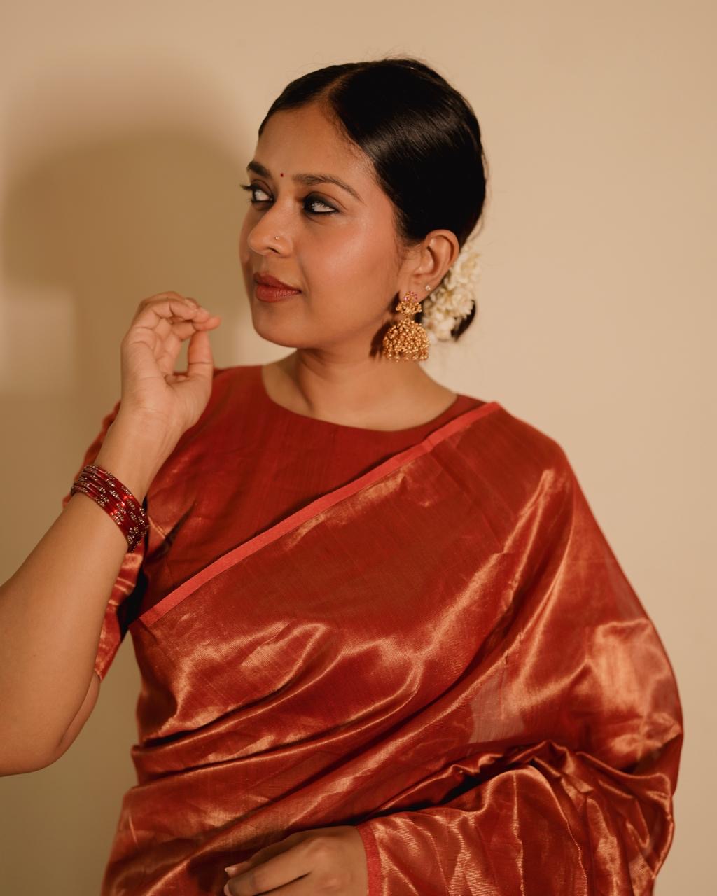 Red Maheshwari saree with zari lines all over